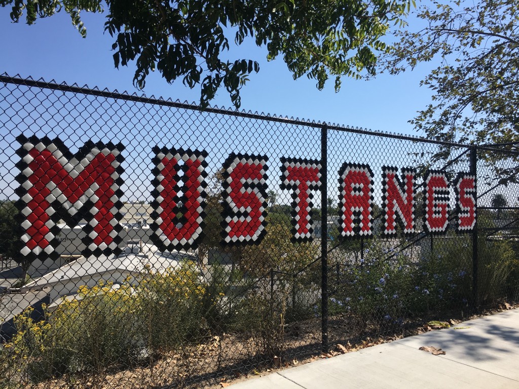 Mustangs put-in-cups sign on Nieto Ave. near the bluff stairs at Rogers Middle School Long Beach, CA