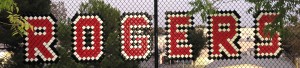 "ROGERS" in cups on fence at Rogers Middle School